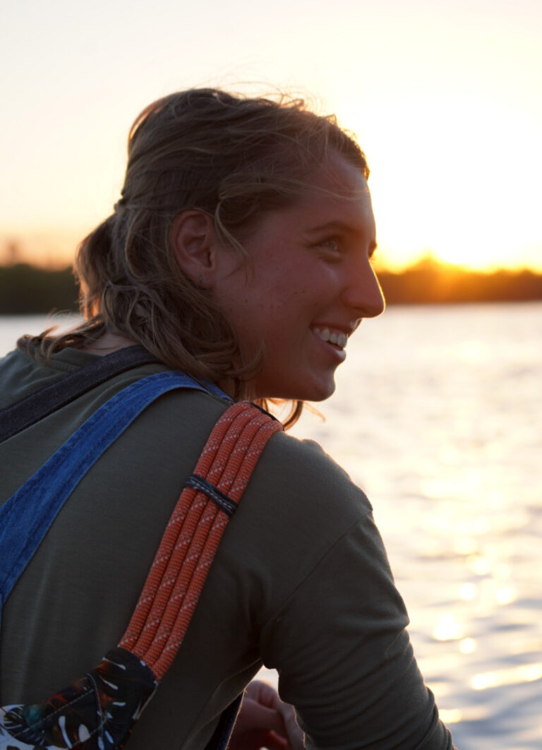 profile portrait at sunset next to the water